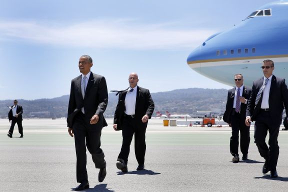 President Barack Obama steps off Air Force One at San Francisco Airport in San Francisco, California, on Friday, June 19, 2015. He is in the Bay Area Friday to speak at a mayor's conference and two fundraisers.